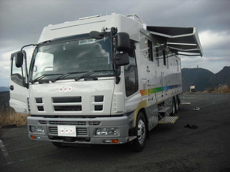 NHK communications van with satellite dish relays live reports from the field.