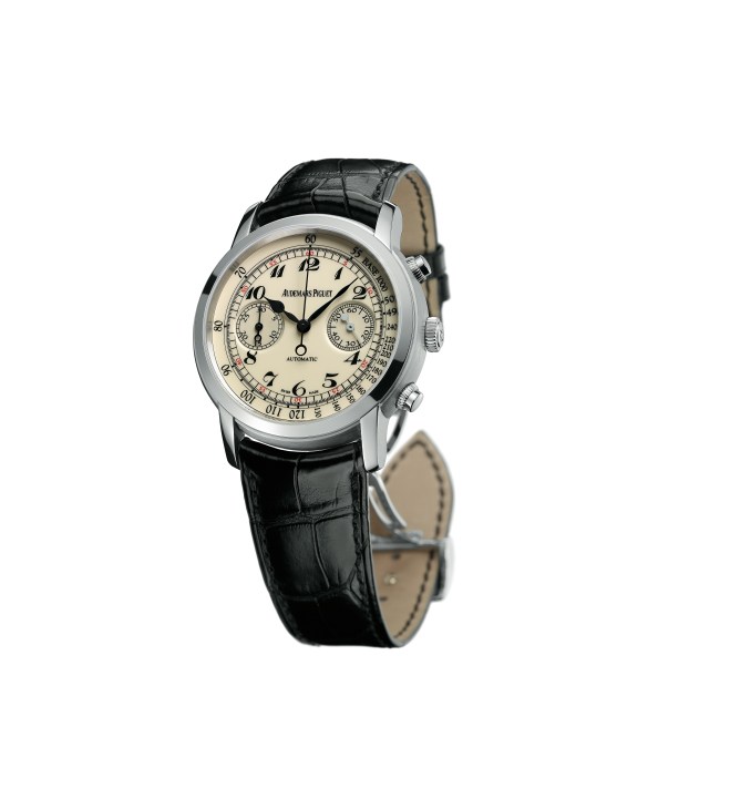 Audemars Piguet chronograph watch with cream dial, black leather strap and silver case.