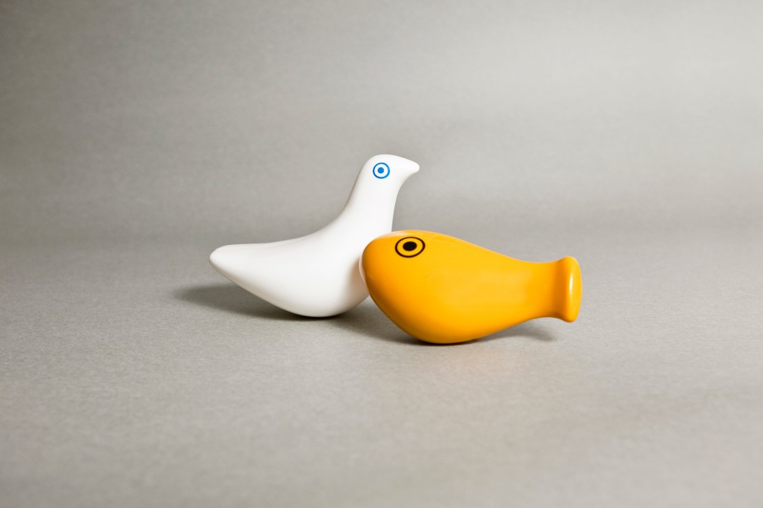 White and yellow ceramic bird and fish bath toys designed by Patrick Rylands.
