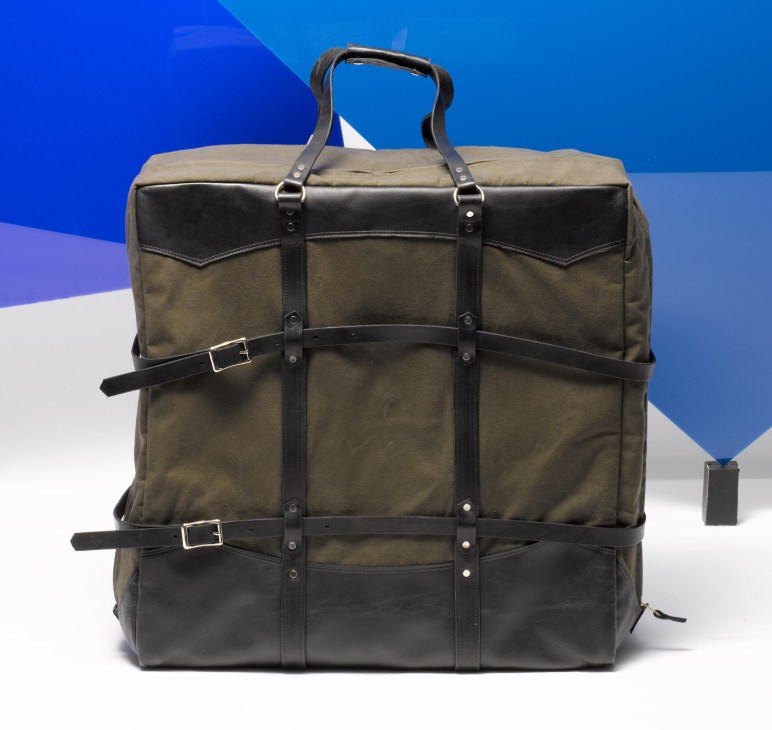 Freeman Transport and Billykirk foldable bike carry-on bag in olive and black with leather straps.