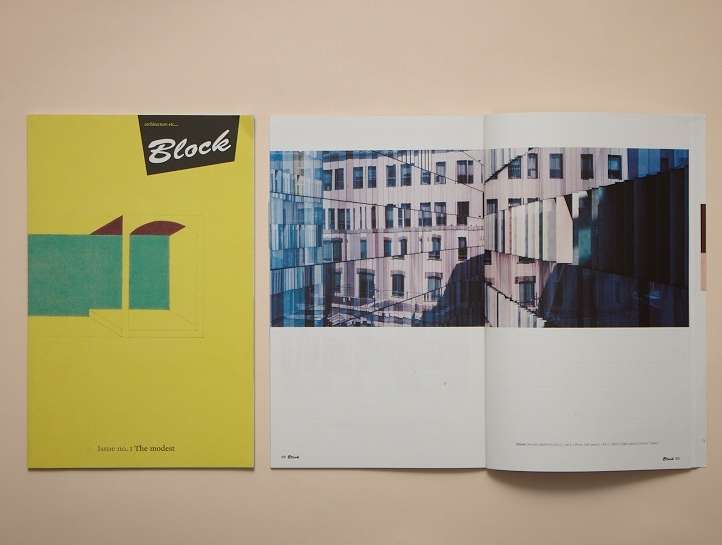 Block architecture magazine with yellow cover and open spread showing urban building photograph.