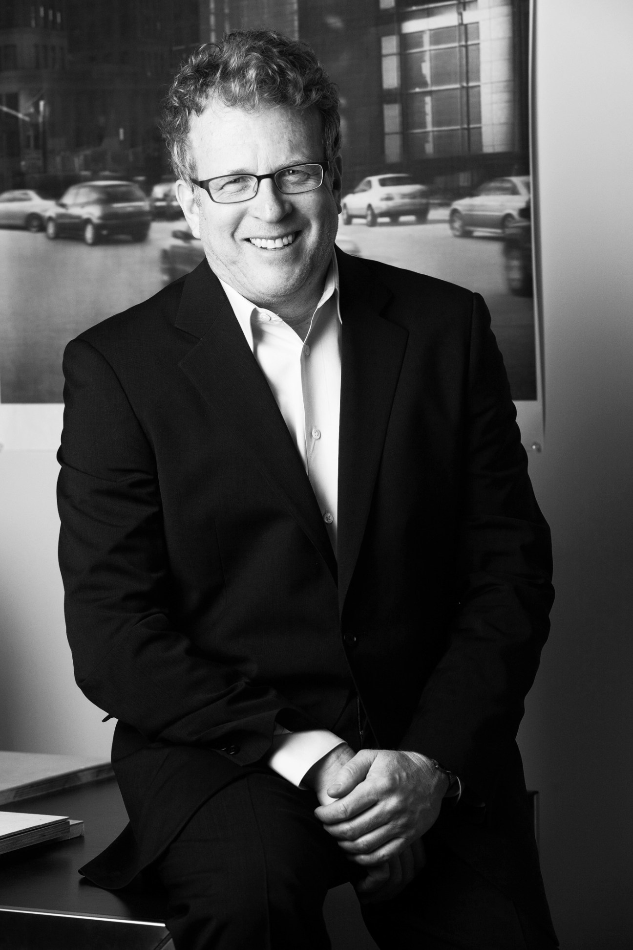 Portrait of Brad Cloepfil, architect and founder of Allied Works Architecture, in a black and white photograph.