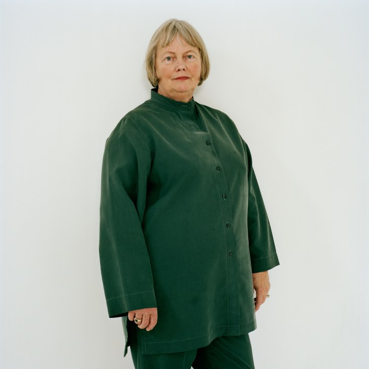 Alanna Heiss, founder of AIR radio station, wearing a dark green button-up shirt against a white background.