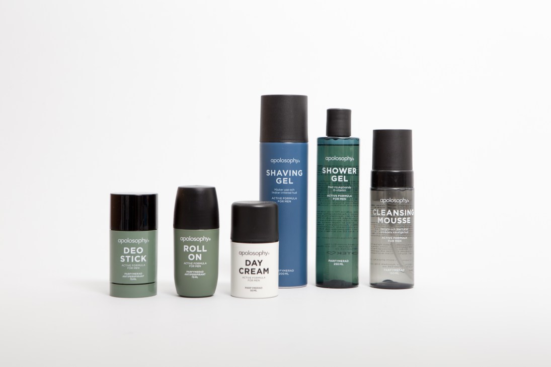 Apolosophy cosmetics line featuring six skincare products in green, blue, and white containers with black caps.