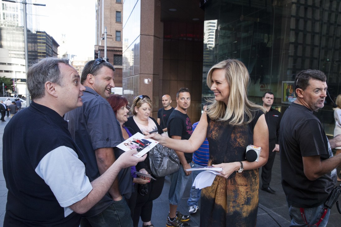 Melissa Doyle interacts with passersby outside the Sunrise studio in Sydney.