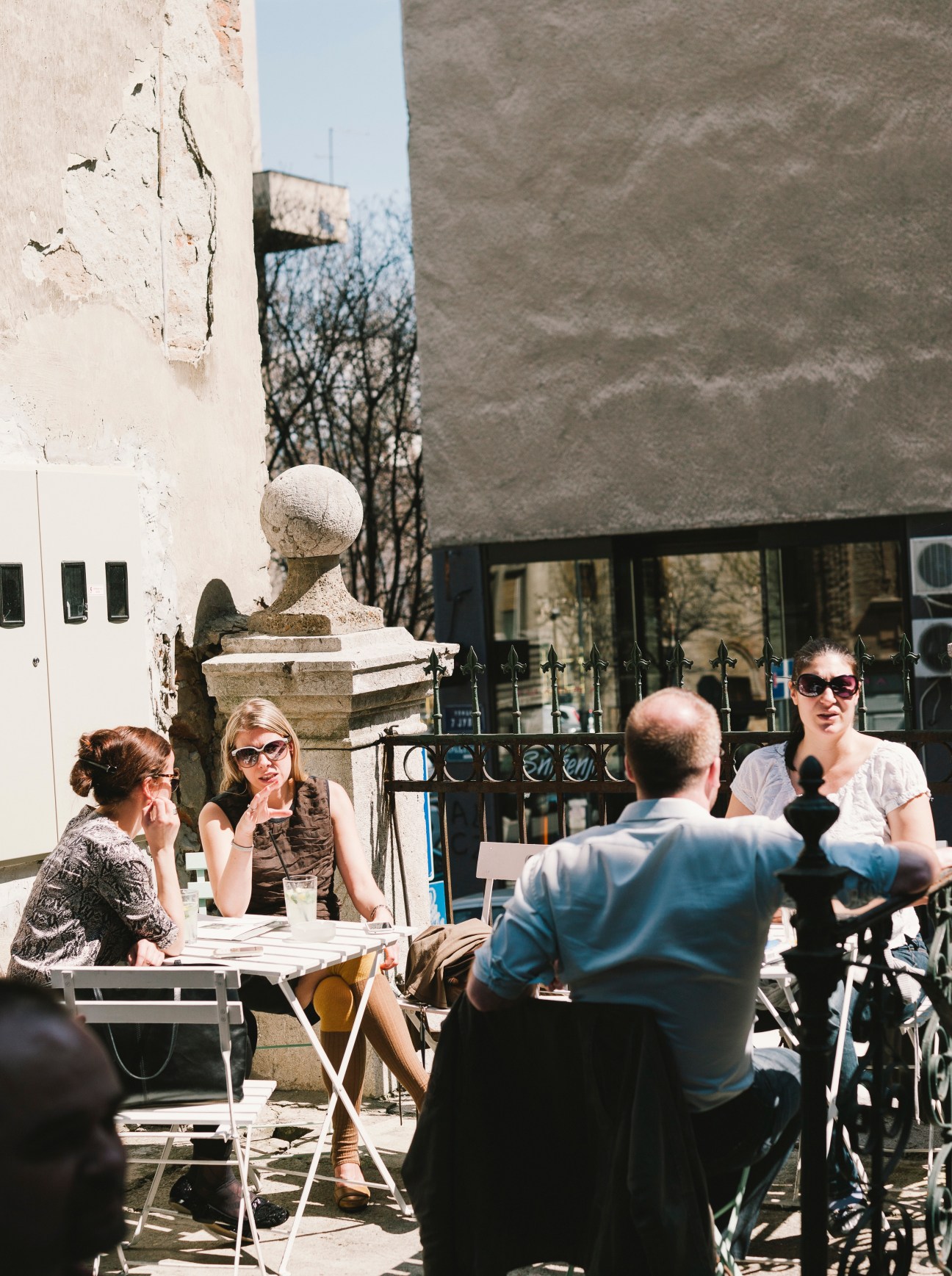 People dining at outdoor tables at Smokvica restaurant in Belgrade's Old Town