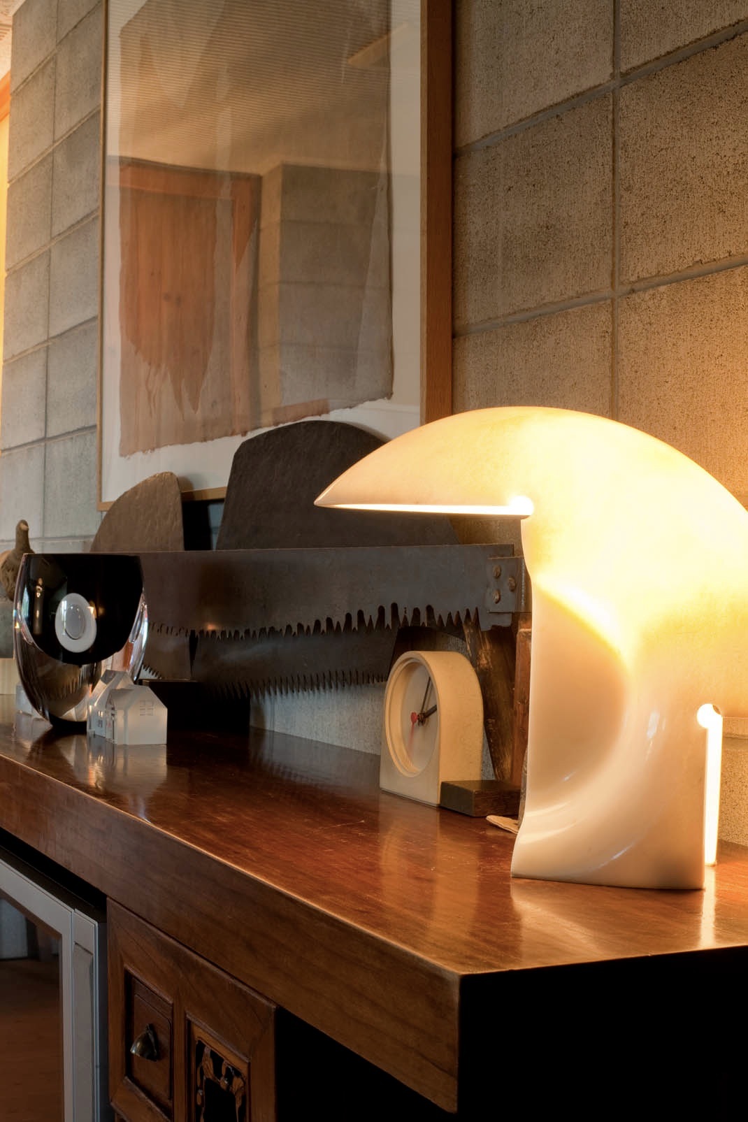 Marble light by Afra & Tobia Scarpa for Flos on wooden surface with design objects.