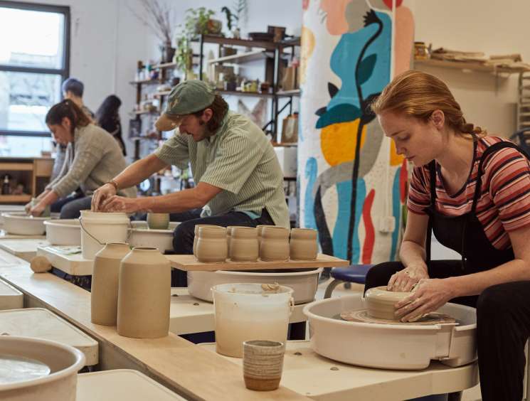 Ceramicists working with clay at Still Life Ceramics studio in Row DTLA.