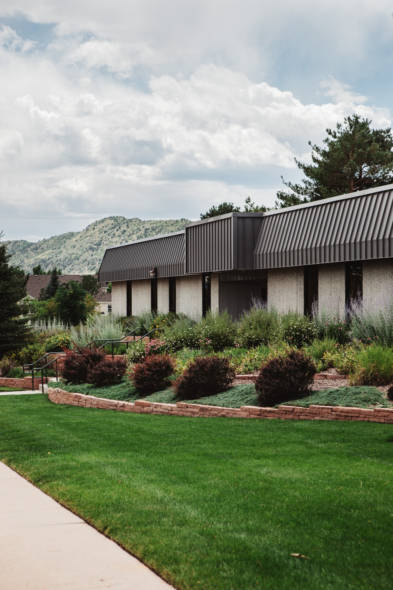 CPI Card Group headquarters building in Littleton, Colorado with metal roof and landscaped grounds.