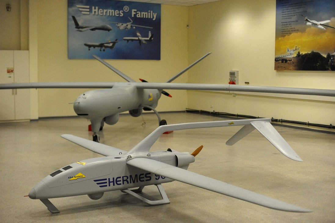 Hermes 90 and Hermes 450 unmanned aerial vehicles displayed in a hangar at Elbit Systems.