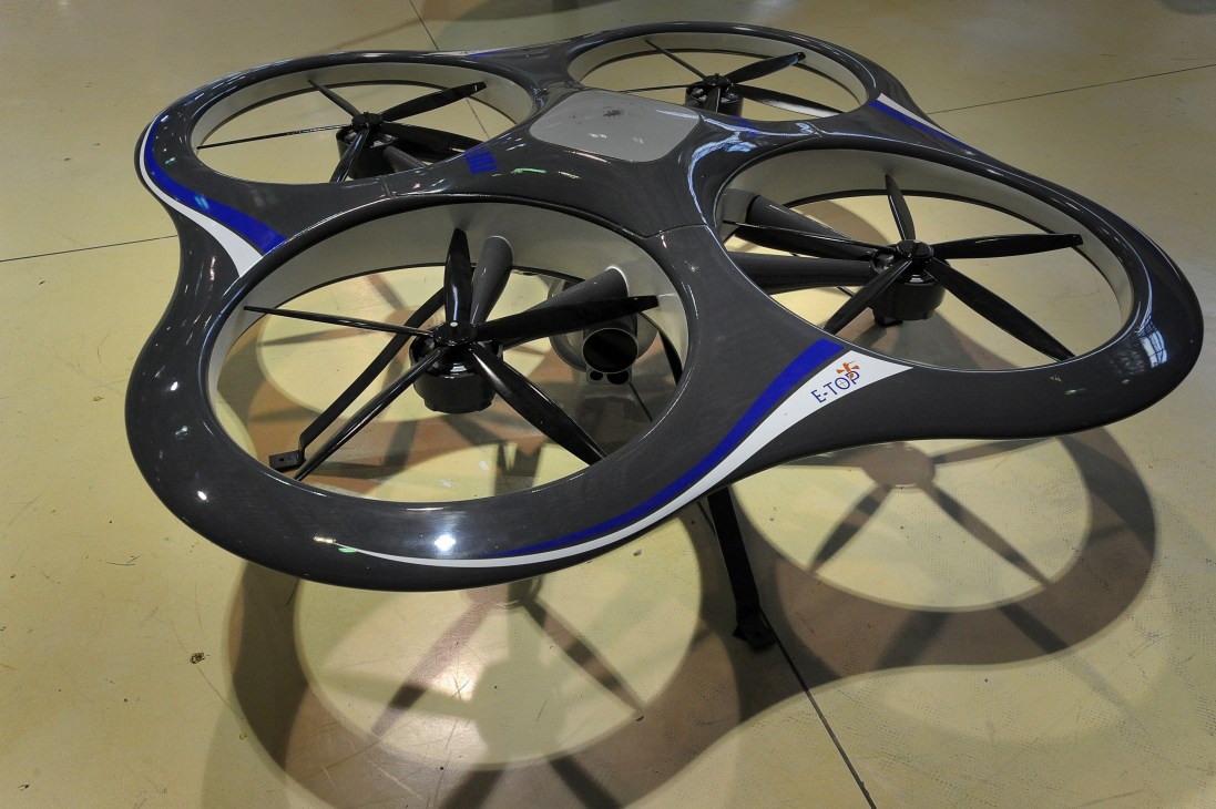 The ETOP (Electric Tethered Observation Platform) drone displayed on a concrete floor.