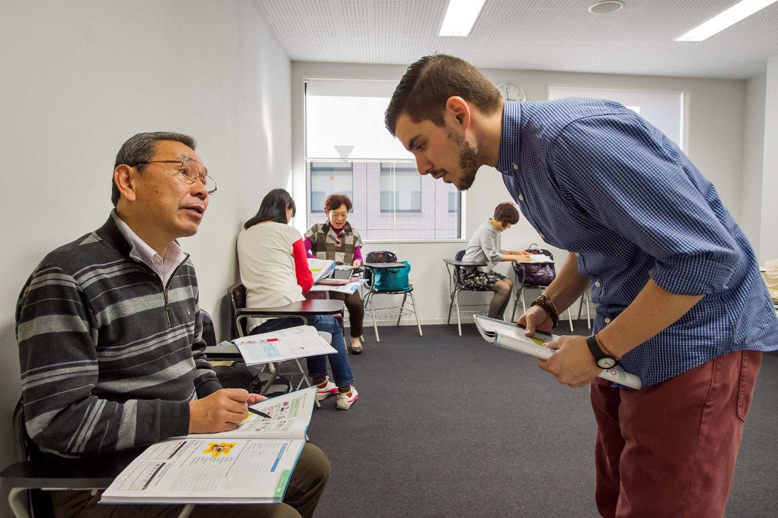 Spanish teacher Federico instructs a student during a lesson at Instituto Cervantes Tokyo.