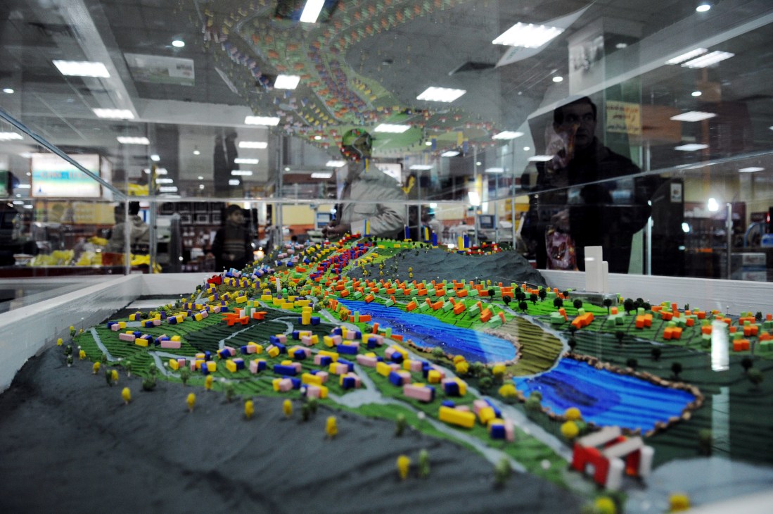 Architectural model of proposed development with colorful building blocks displayed in shopping center