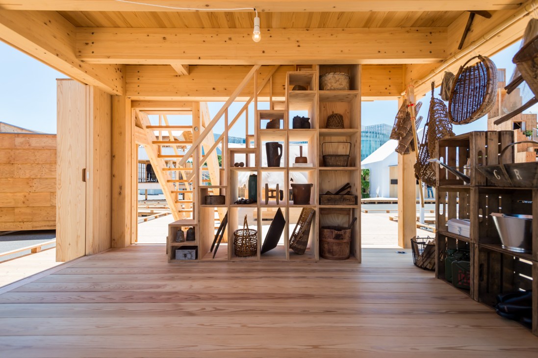 Wooden interior space with shelving units displaying baskets and home goods at Tanada Terrace Office.