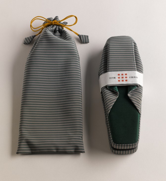 Pair of hand-made silk striped indoor slippers by Abe Sangyo with green felt interior and gold cord tie.