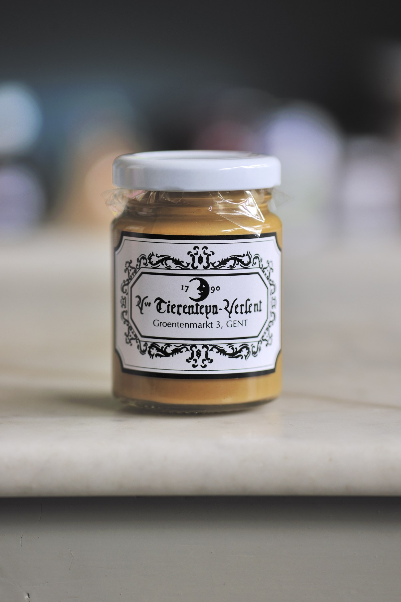 Jar of Tierenteyn-Verlent Ghent mustard with white lid and ornate label dated 1790.