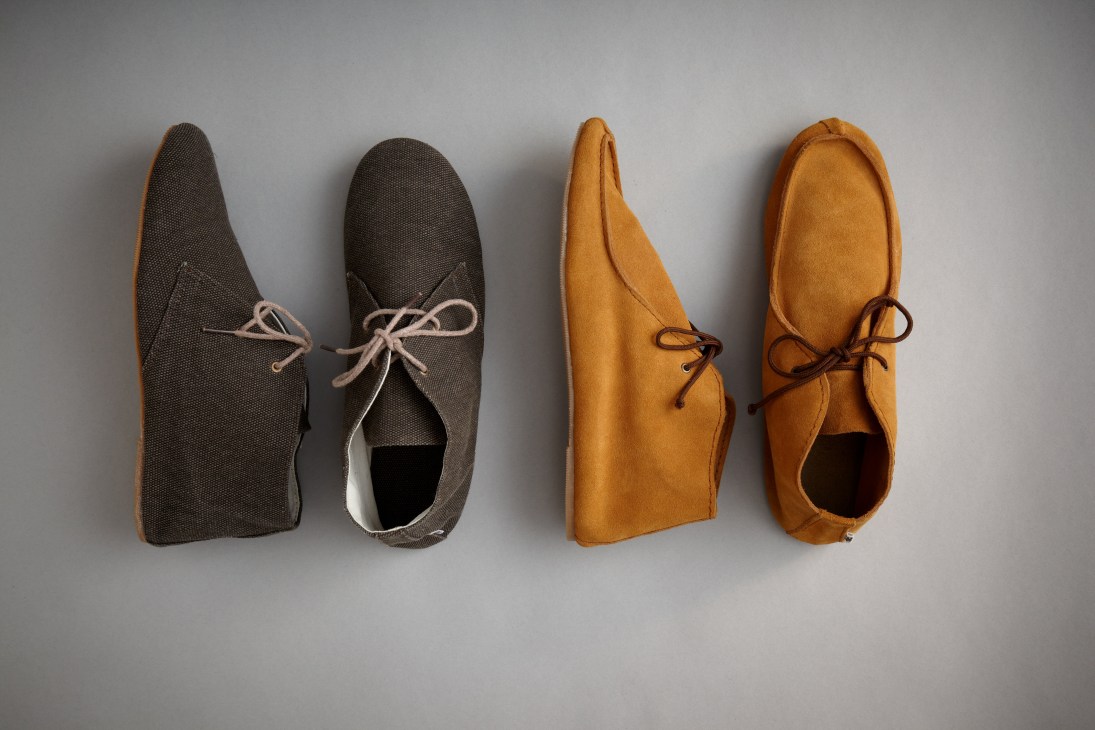 Four handmade HOBES desert boots in grey denim and tan suede with lace-up closures.