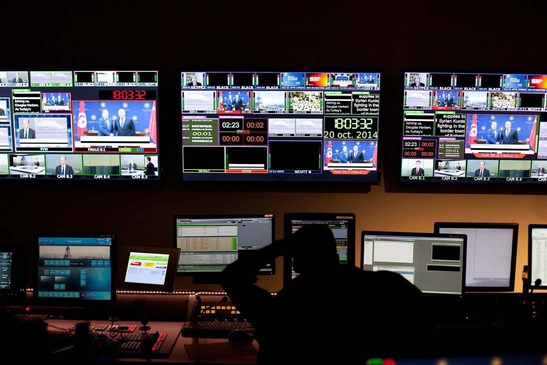 France 24 broadcast control room with multiple monitors displaying live feeds and production displays.