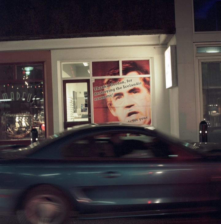 Reykjavik boutique window display with Gordon Brown portrait and text criticizing him for destroying Iceland's economy.