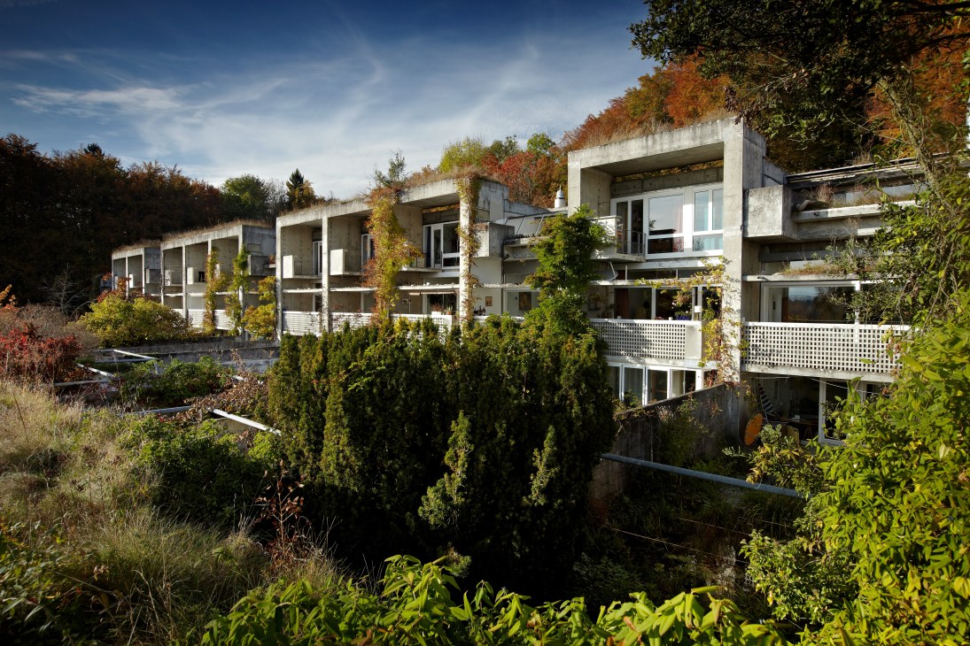 Aerial view of Halen Estate showing terraced housing formation in forest setting