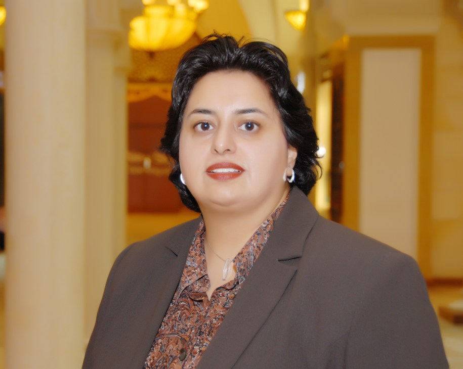 Portrait of Amani Choudhry, CEO and founder of Mayfair Wealth Management, in professional business attire.