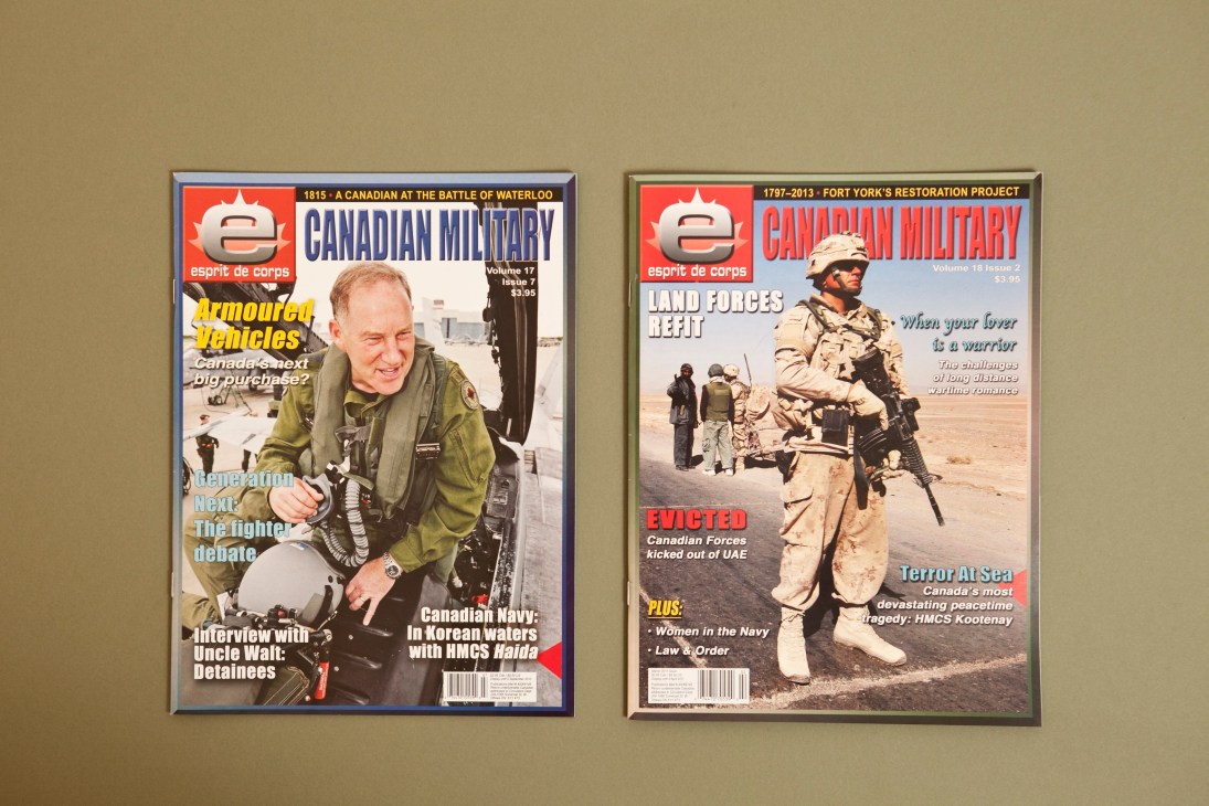 Two framed covers of Canadian Military magazine displaying military personnel and equipment.