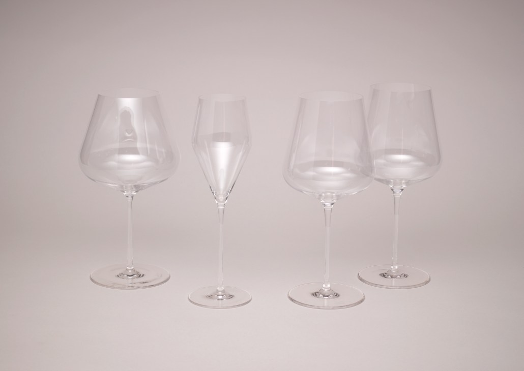 Four clear lead-free goblets with slim stems from Zalto's Denk'Art series, mouth-blown and heated to 1,300°C.