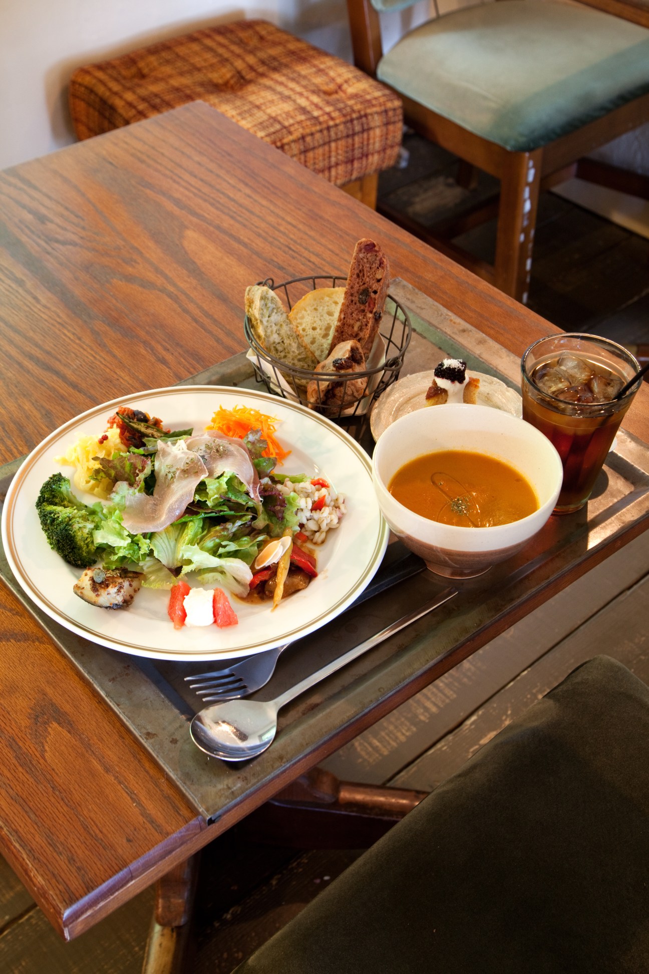 Plated salad with soup and bread at Ploughman's Lunch Bakery in Okinawa.
