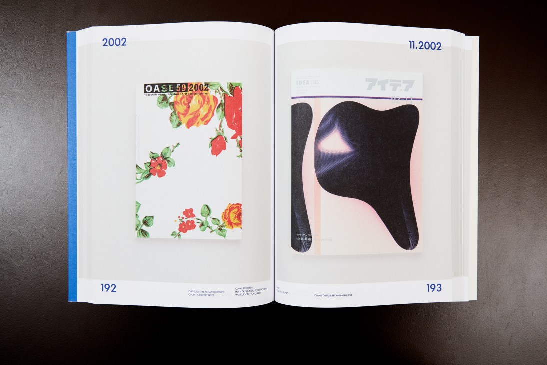 Open design book spread showing OASE magazine cover with floral pattern and abstract black form design.