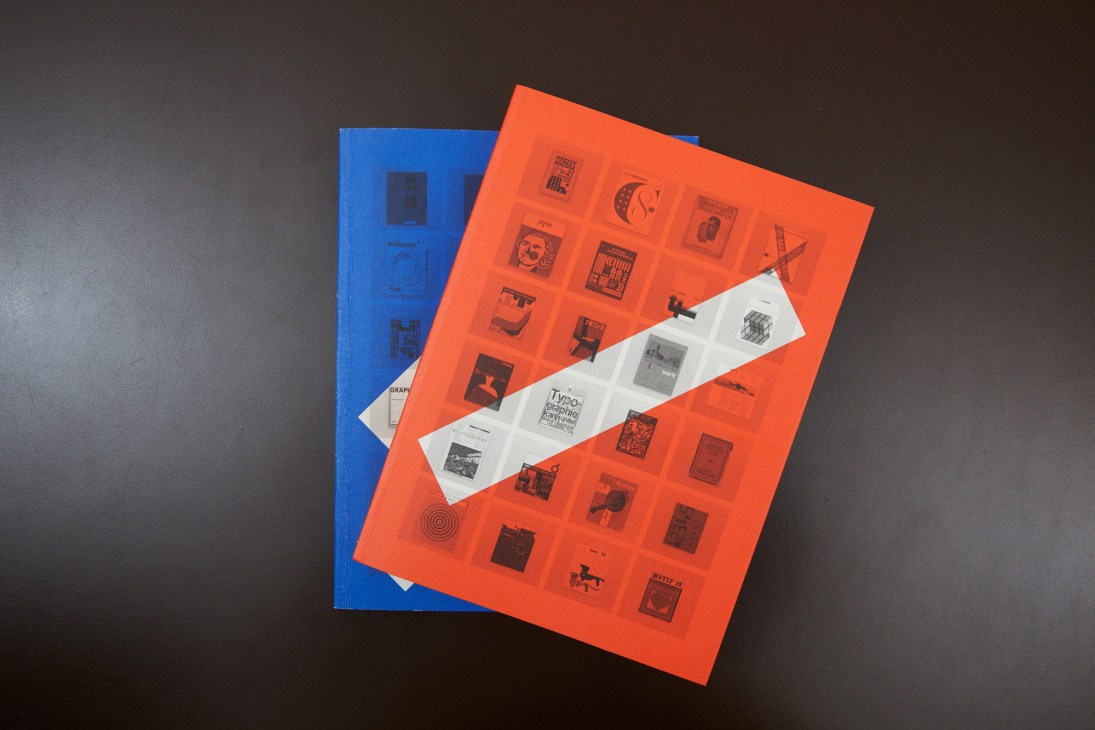 Blue and orange Unit Editions design books displayed with a white publication insert showing typography examples.