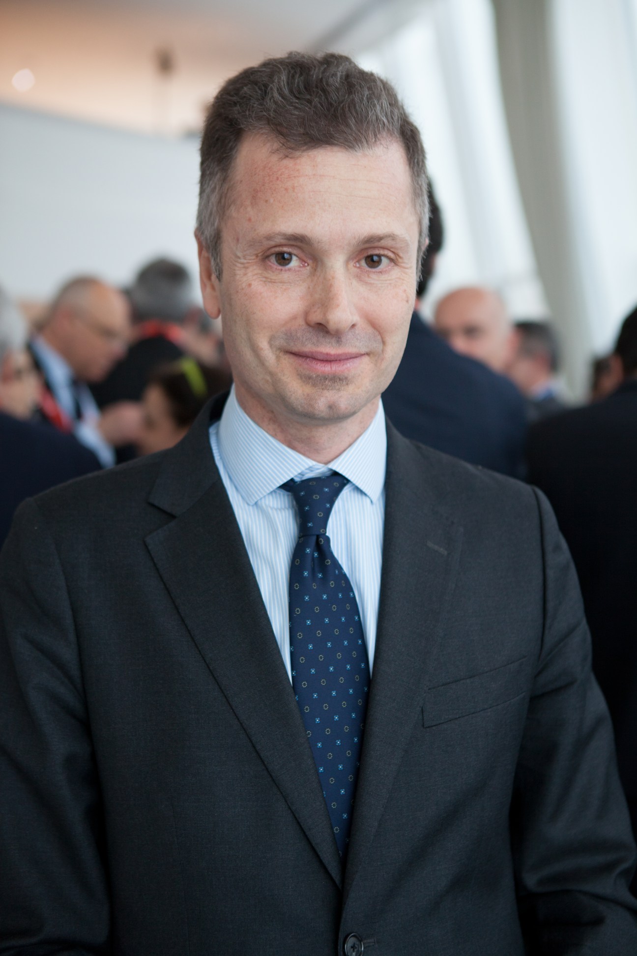 Filippo Rean, Director of the Real Estate Division, in business attire at Mipim.