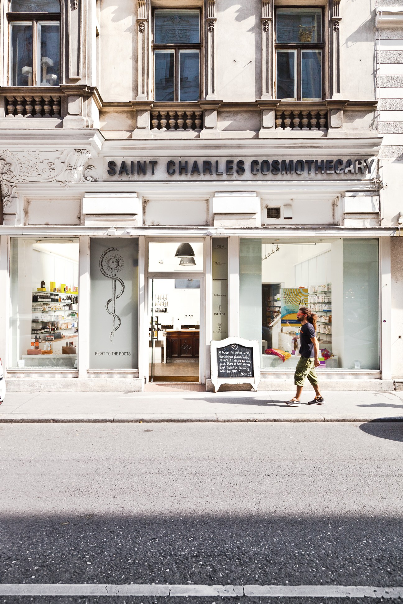 Saint Charles Apothecary storefront in Vienna with white facade and large windows displaying products
