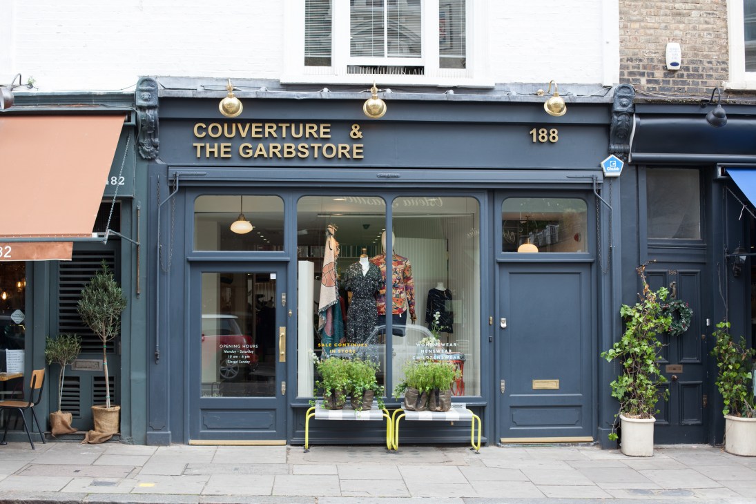 Storefront of Couverture and the Garbstore at 188 Notting Hill, London, with navy blue facade and gold lettering.