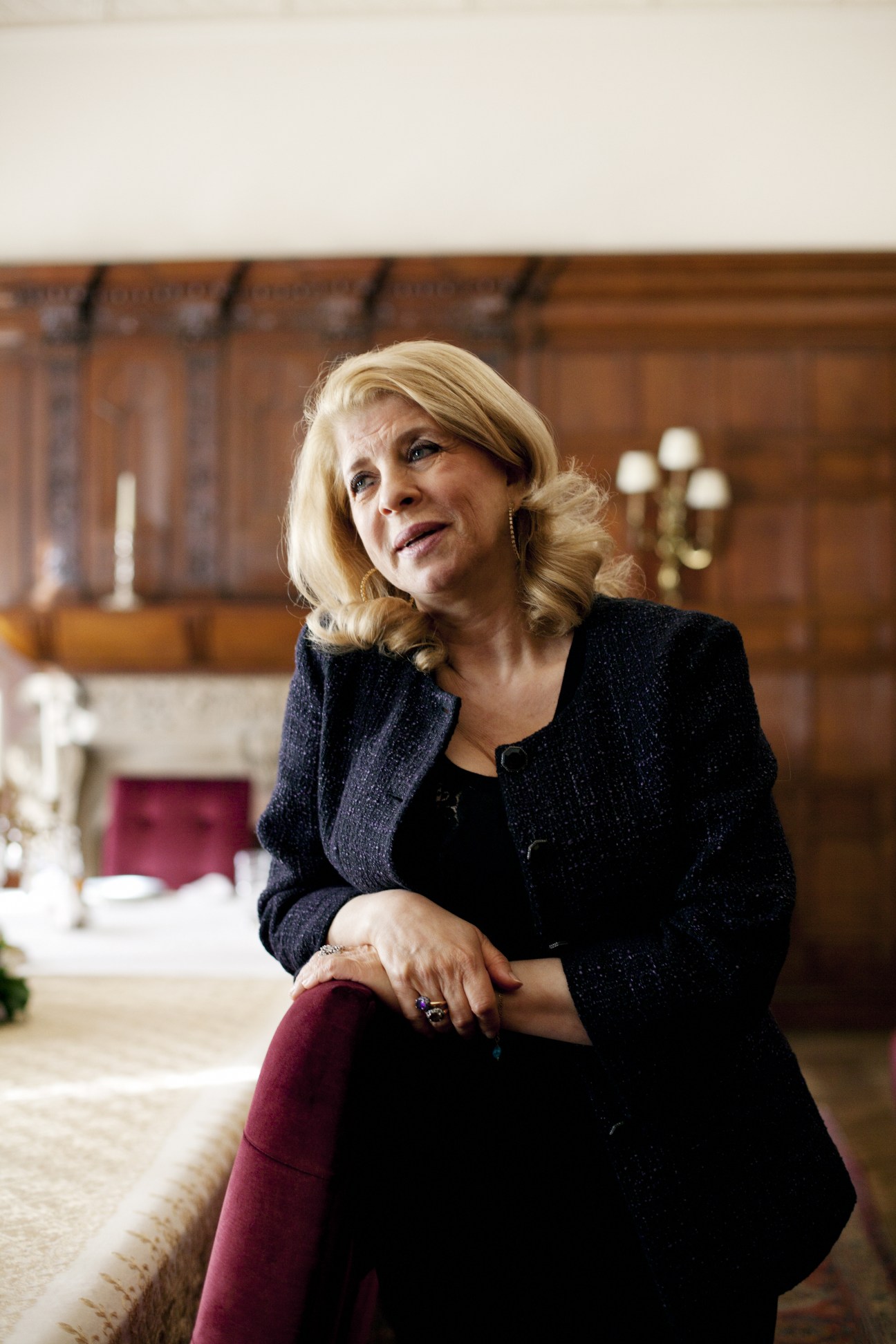 Inaam Osseiran, Lebanon's ambassador to London, sits in the embassy's wood-paneled interior.
