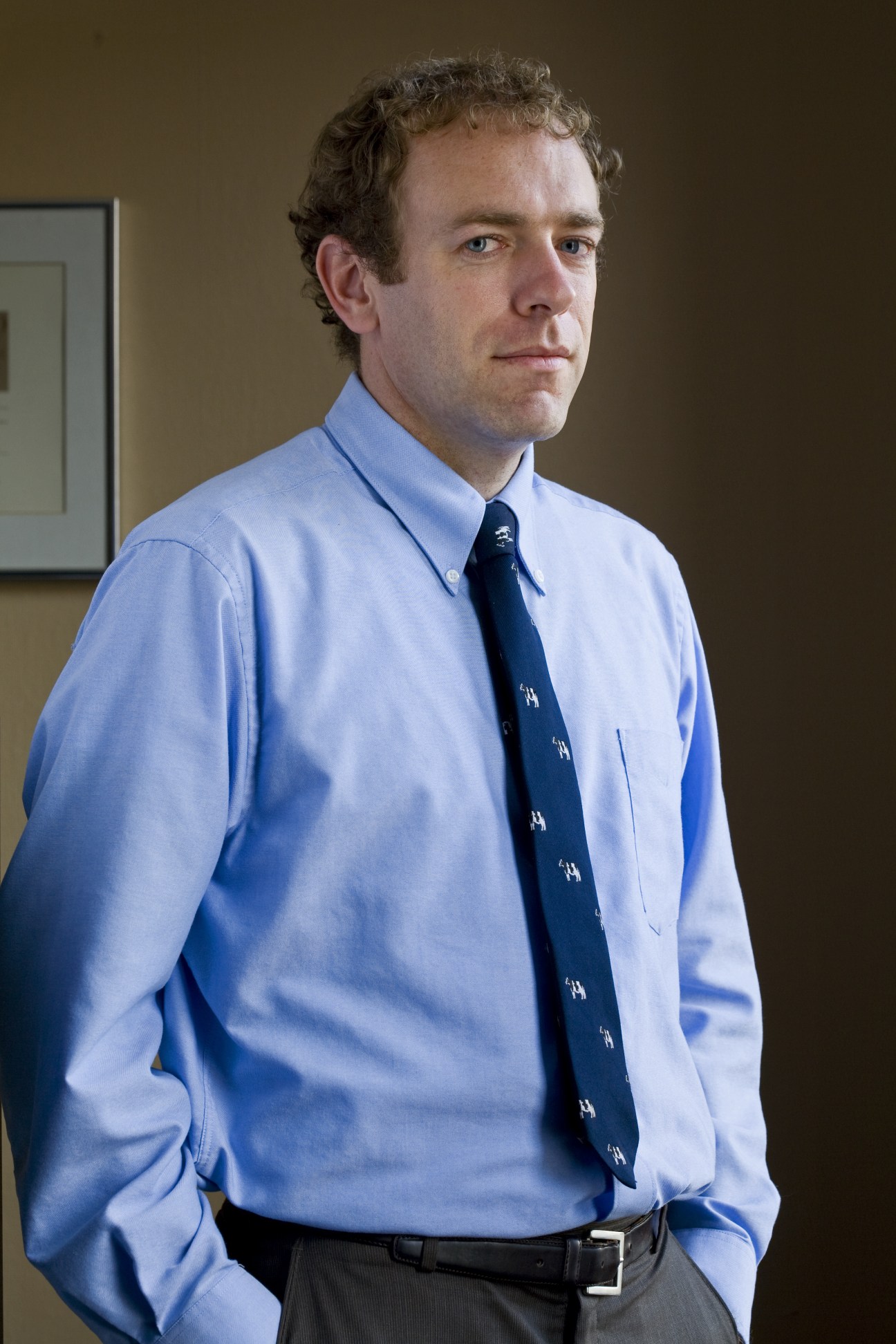 R John Mitchell, Rutland Herald publisher, wearing a light blue shirt and dark tie.