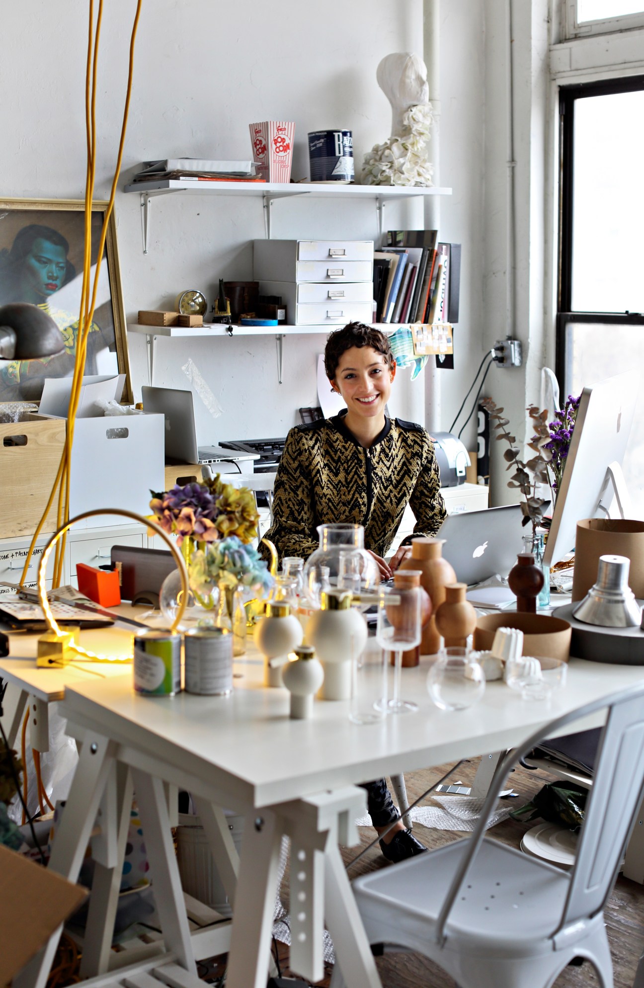Designer Anna Karlin in her New York studio surrounded by handcrafted ceramics and objects.