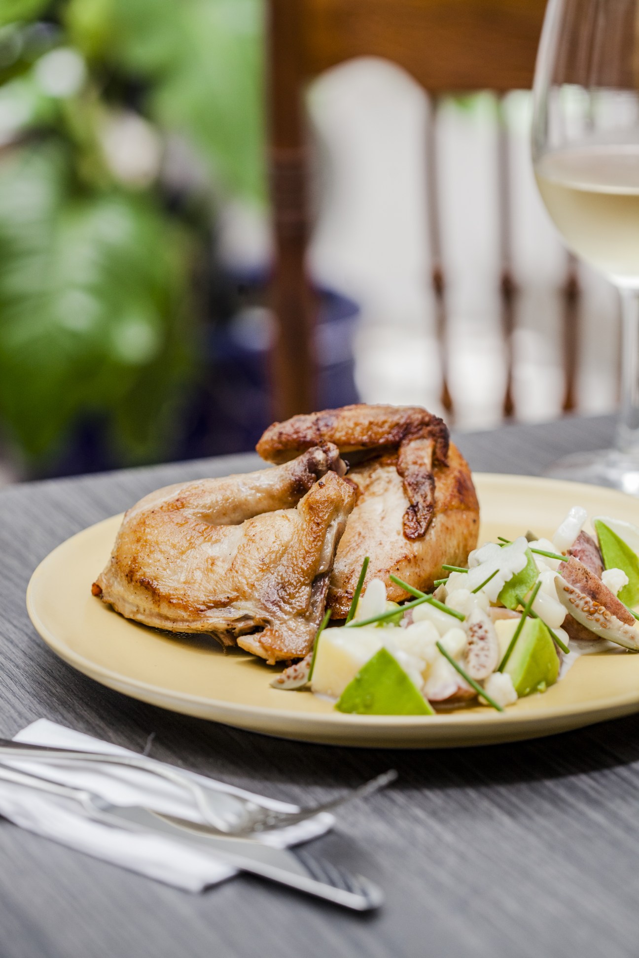 Roasted duck with apple and cheese on a cream plate at Molle Café & Bistro, Lima.