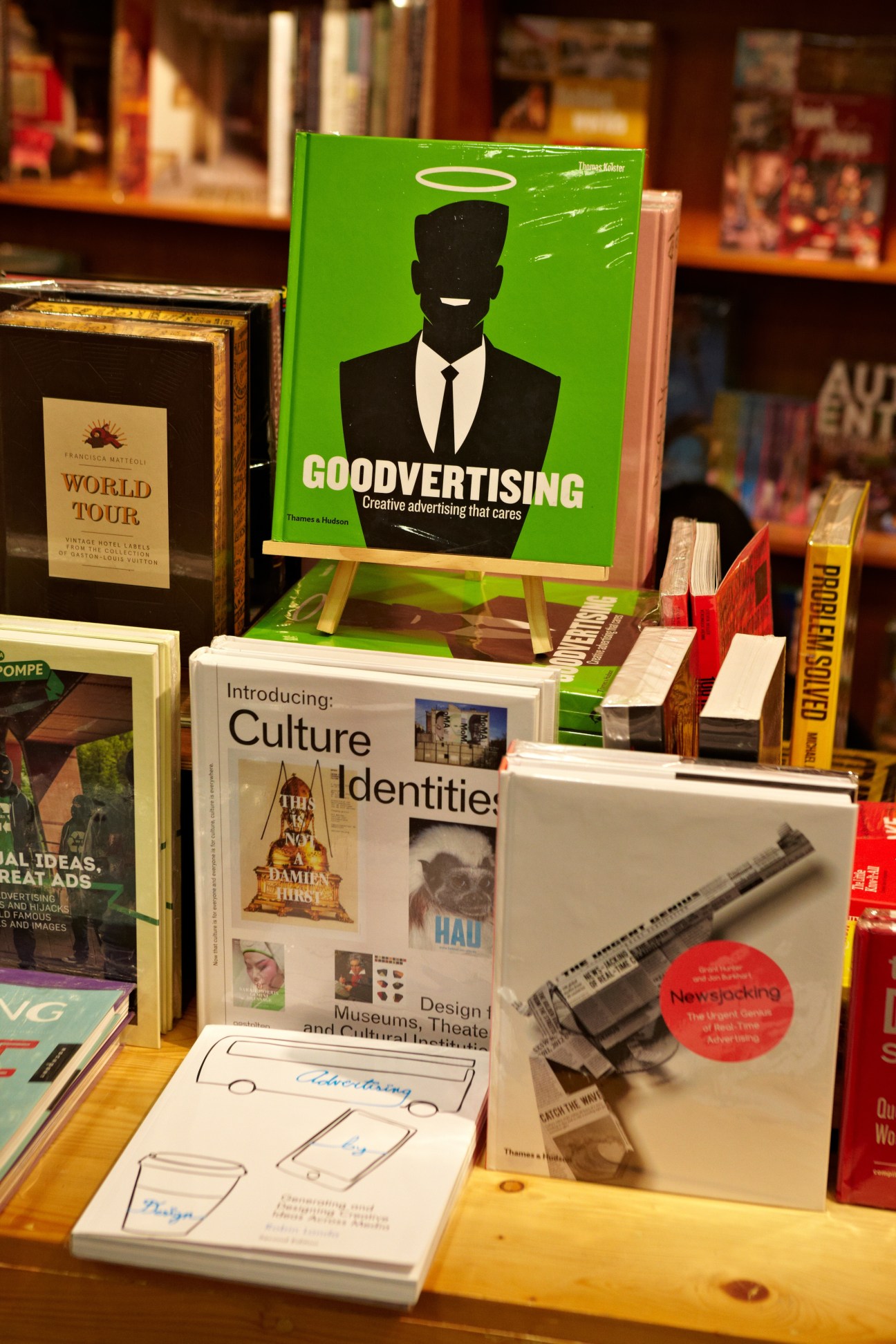 Bookshop display at Aksara with design and advertising books including Goodvertising title visible.