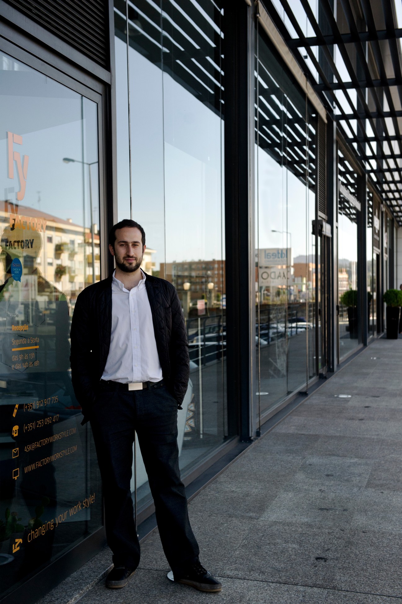 Tiago Gomes Sequeira stands outside Factory Work Style co-working business centre in Braga, Portugal.