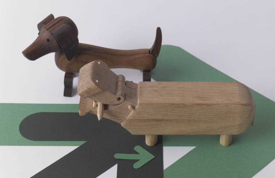 Wooden toy animals by Rosendahl including a dachshund and hippo carved from oak and walnut.