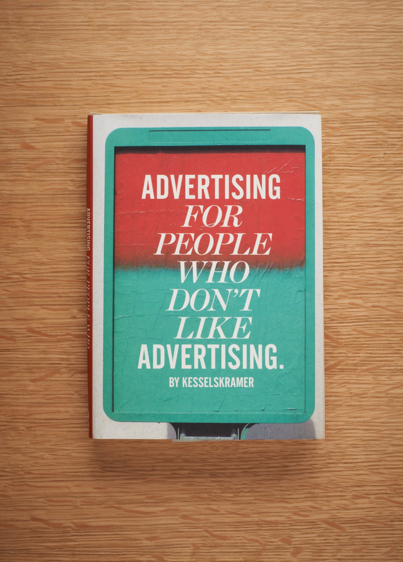 Book cover by KesselsKramer with red and turquoise design reading "Advertising for people who don't like advertising"