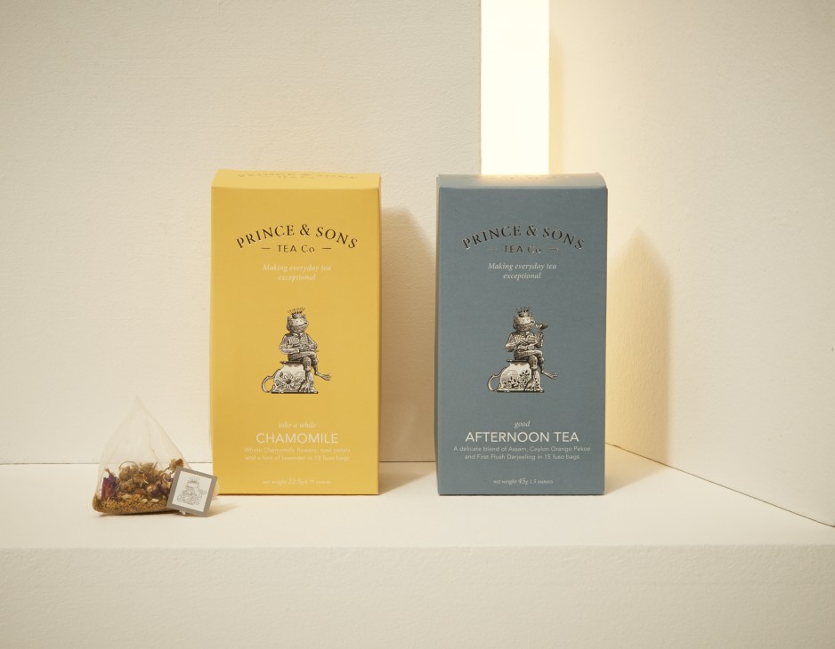 Prince & Sons Tea Co teabag boxes in yellow chamomile and blue afternoon tea varieties with frog mascot.