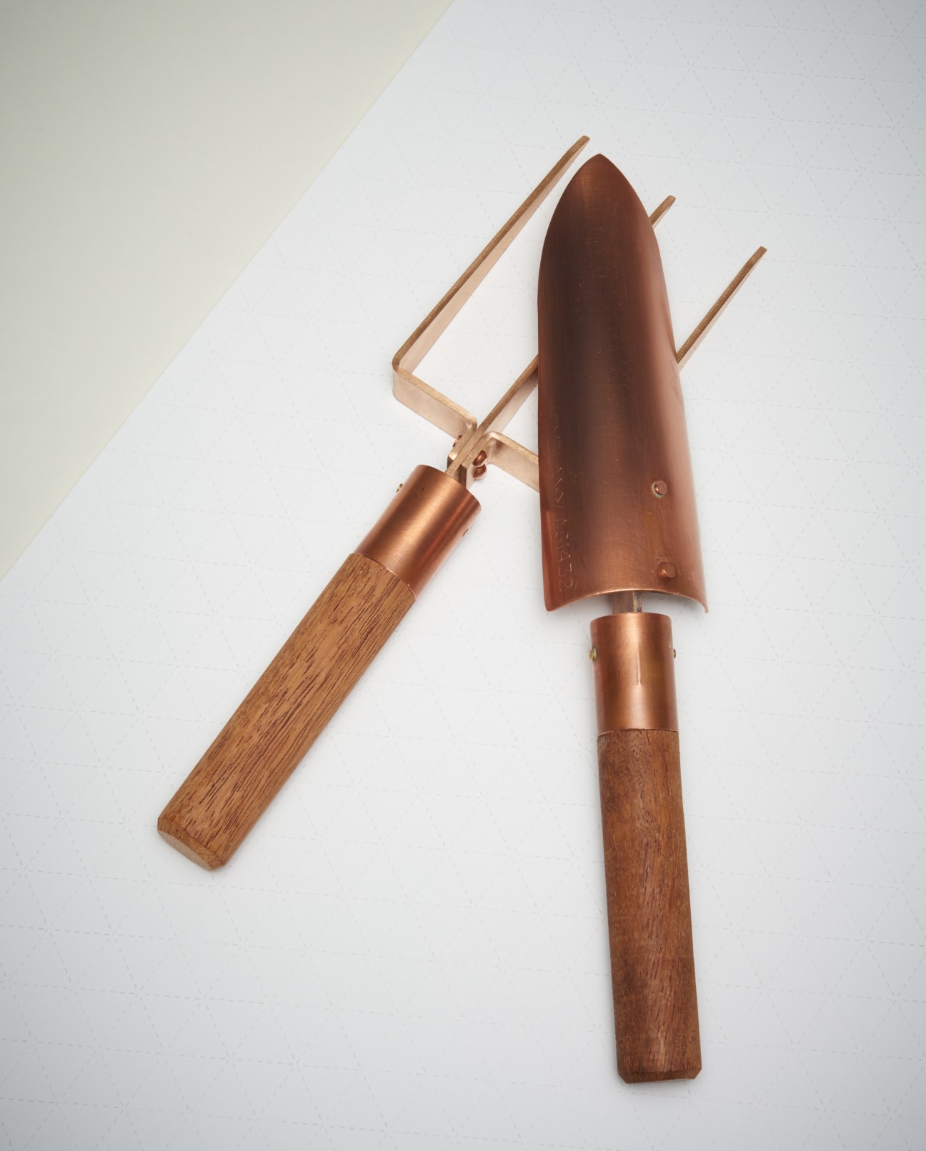 Copper and wooden garden tools from Grafa featuring rust-resistant reclaimed copper with bronze and timber handles.