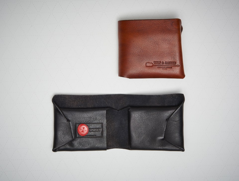 Wolf & Maiden Tsuyoi wallet in brown and black leather displayed on white background.