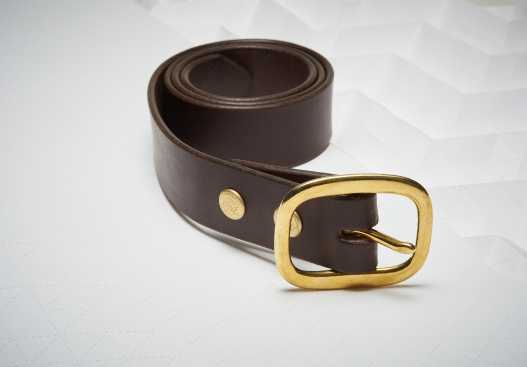 Brown leather belt with brass buckle by Wood & Faulk