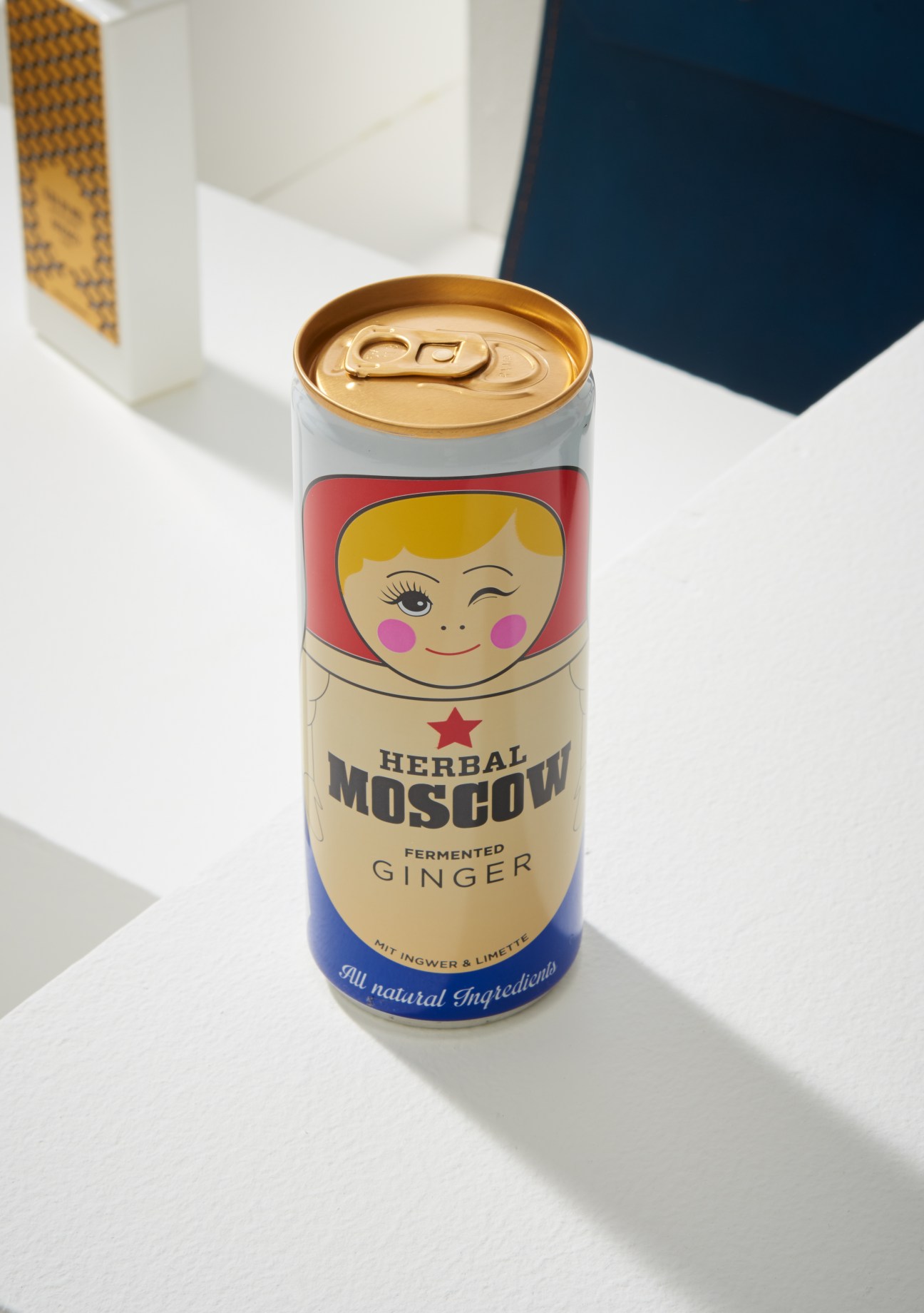 Herbal Moscow fermented ginger beer can with gold lid and vintage-style label featuring an illustrated woman's face.