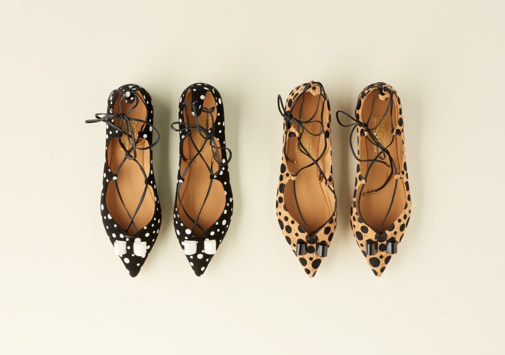 Four pointed-toe flats with lace-up detailing in black-and-white polka dot and leopard print patterns.