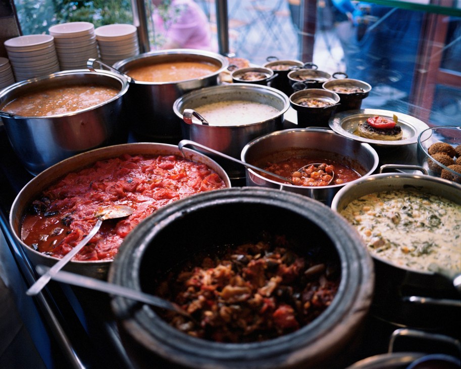 Multiple pots and pans of Turkish dishes displayed at Çiya restaurant in Kadıköy.