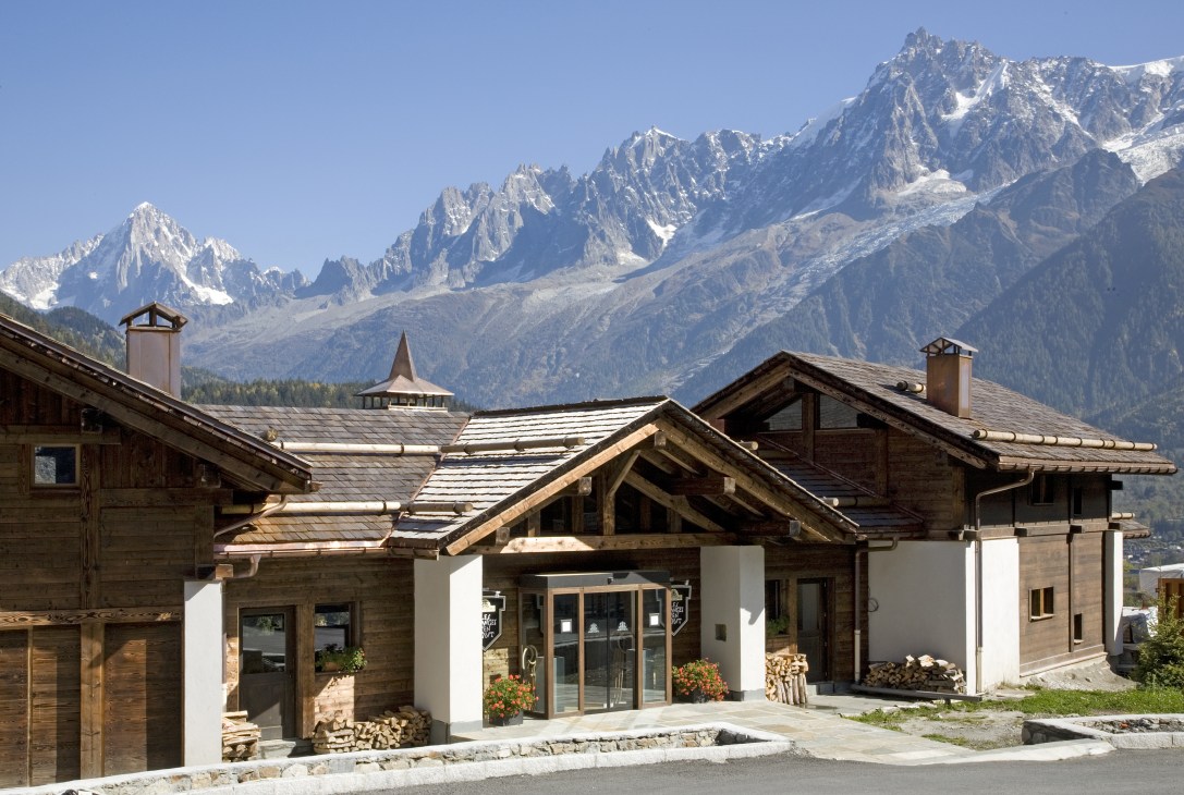 Les Granges d'en Haut alpine lodge with Mont Blanc massif peaks in background, Chamonix.