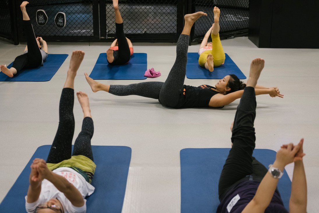 Din Tai Fung employees attend a free gym class as part of the company's staff wellness benefits.
